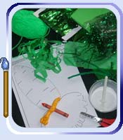 Carrot collaging craft activity that looks at the colour orange, green and root vegetables