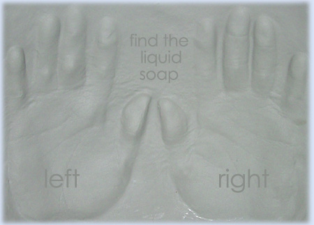 Varnished clay handprint trays for liquid soap and hand matching