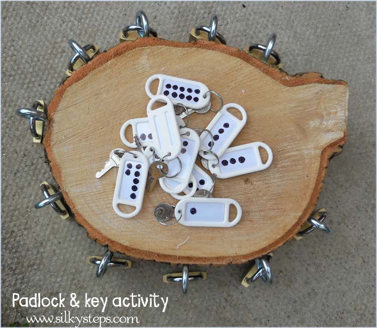 Padlock and key turning activity for children's outdoor play