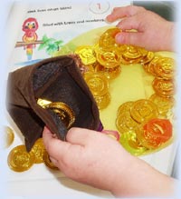 Picking up pirate coins and filling loot pouches