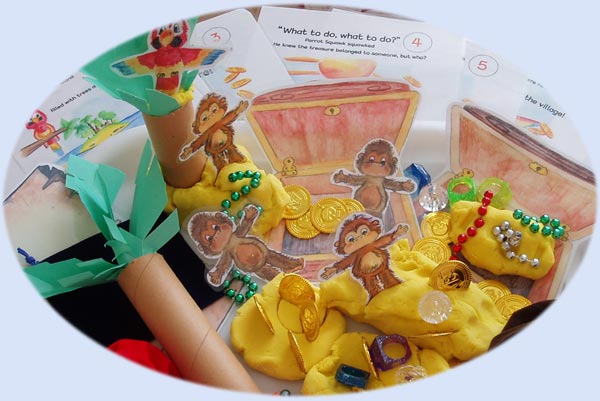 A parrot, monky, pirate and treasure playdough themed activity