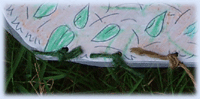 hole punch base sheet and nest to secure them together