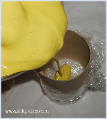 Pour thecoloured plaster mix into prepared mould