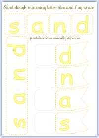 letter tiles and flagsfor literacy in sand dough ..
