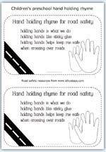 Hand holding road safety rhyme - sticky glue